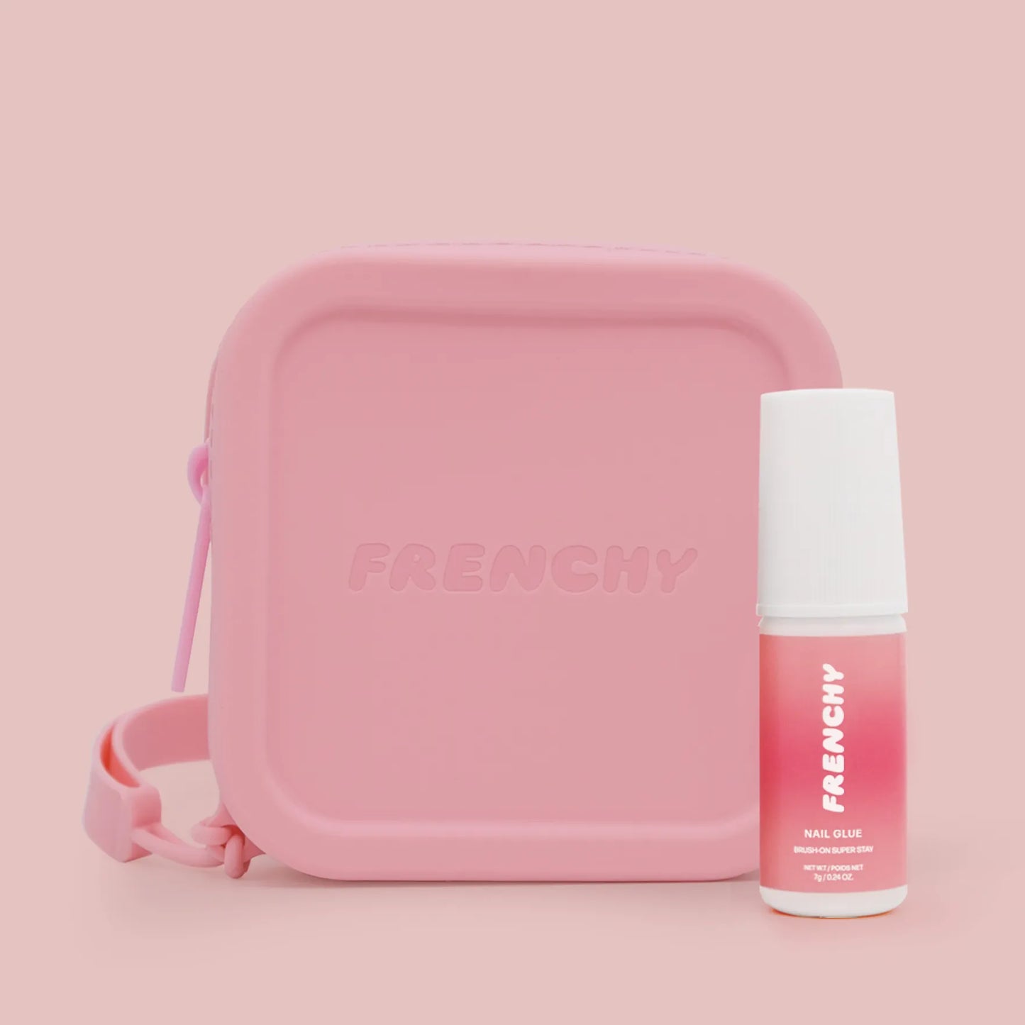Product photo of 'Frenchy Silicon Travel Case' with 'Brush-On Nail Glue,' showcasing a bundled set that includes the travel case for storage and transportation, along with the brush-on nail glue for easy application and maintenance of your press-on nails.